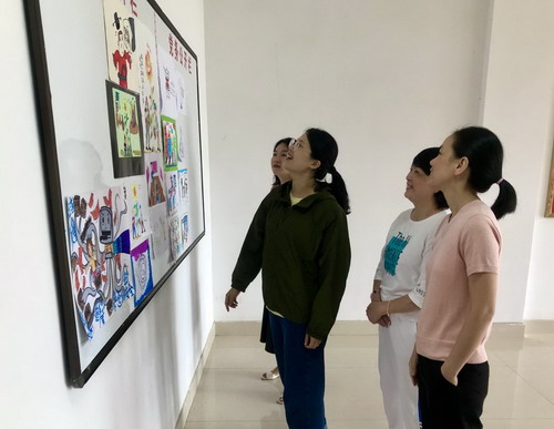 吴瑶：龙岩分公司举办“追求卓越，崇尚质量”产品质量漫画展活动_调整大小.jpg